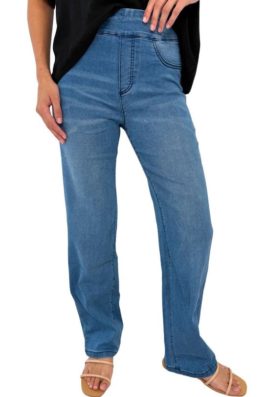 Woman wearing our feel good jeans relaxed fit jeans