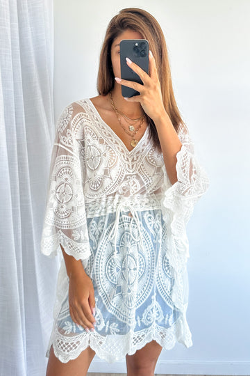 White: kym