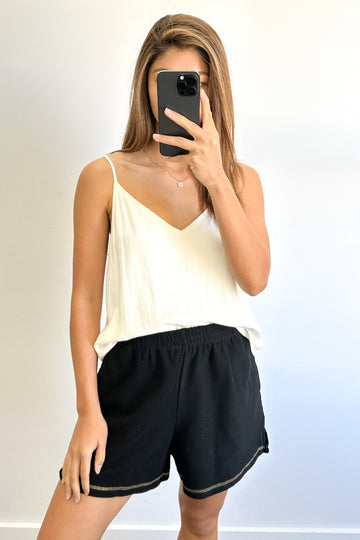 Black: kym