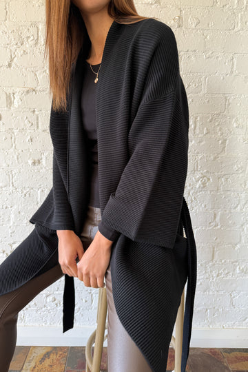 Black: kym