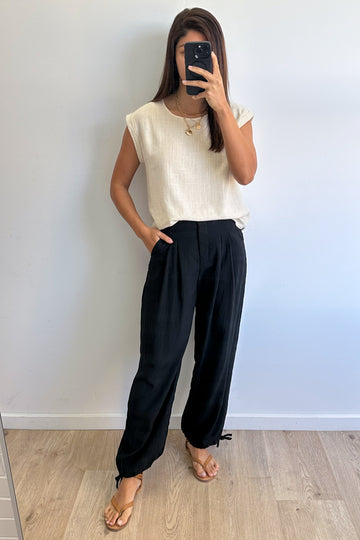 Black: kym