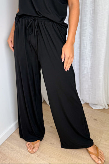 Black: kym