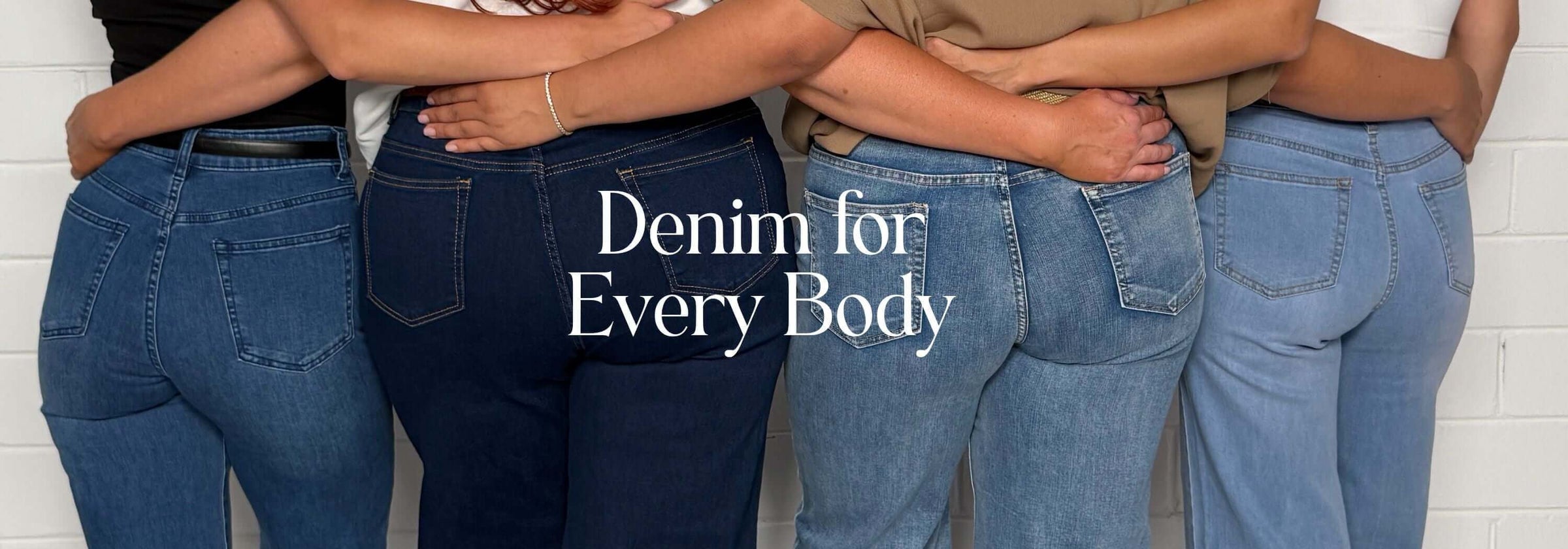 Group of women wearing Whitley, Skinny, and Relaxed Jeans in sizes 8 to 20, showcasing diverse body shapes